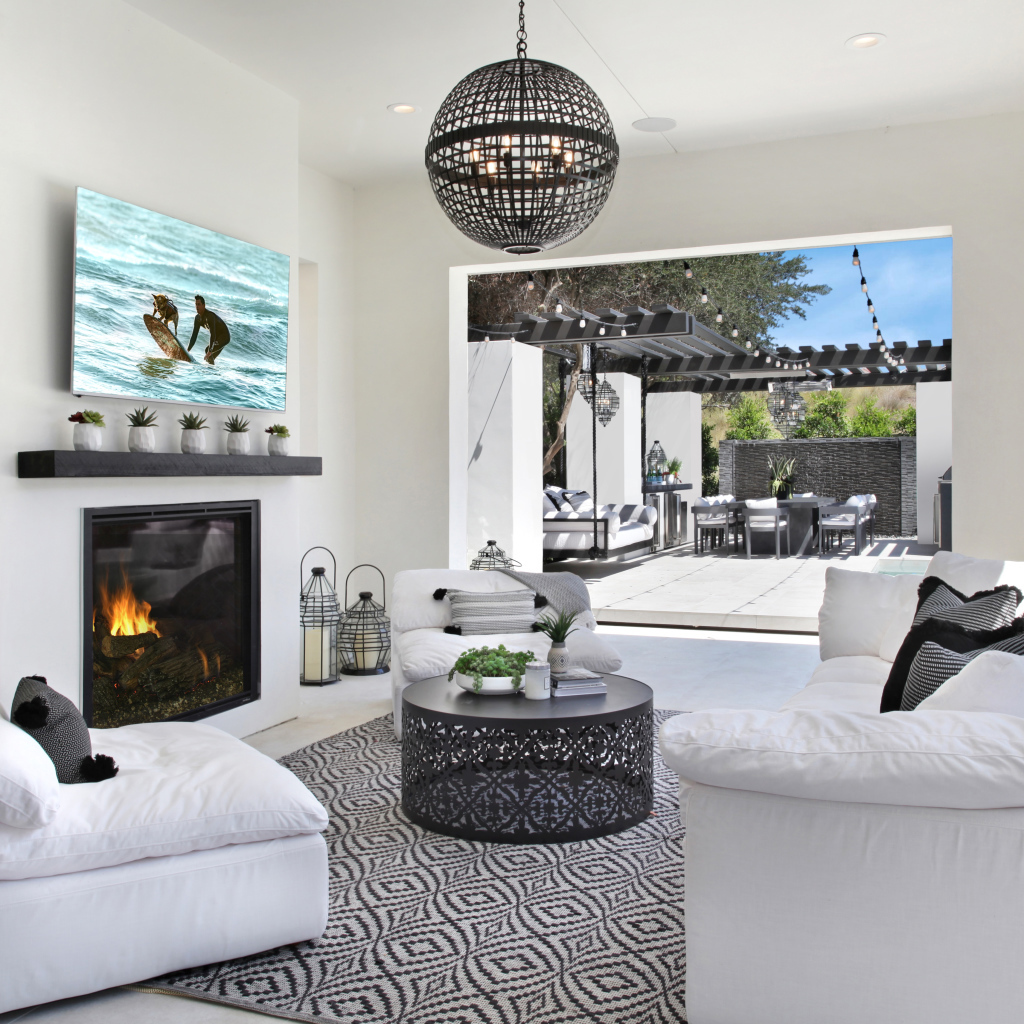 Stylish black and white interior in a room with access to the terrace