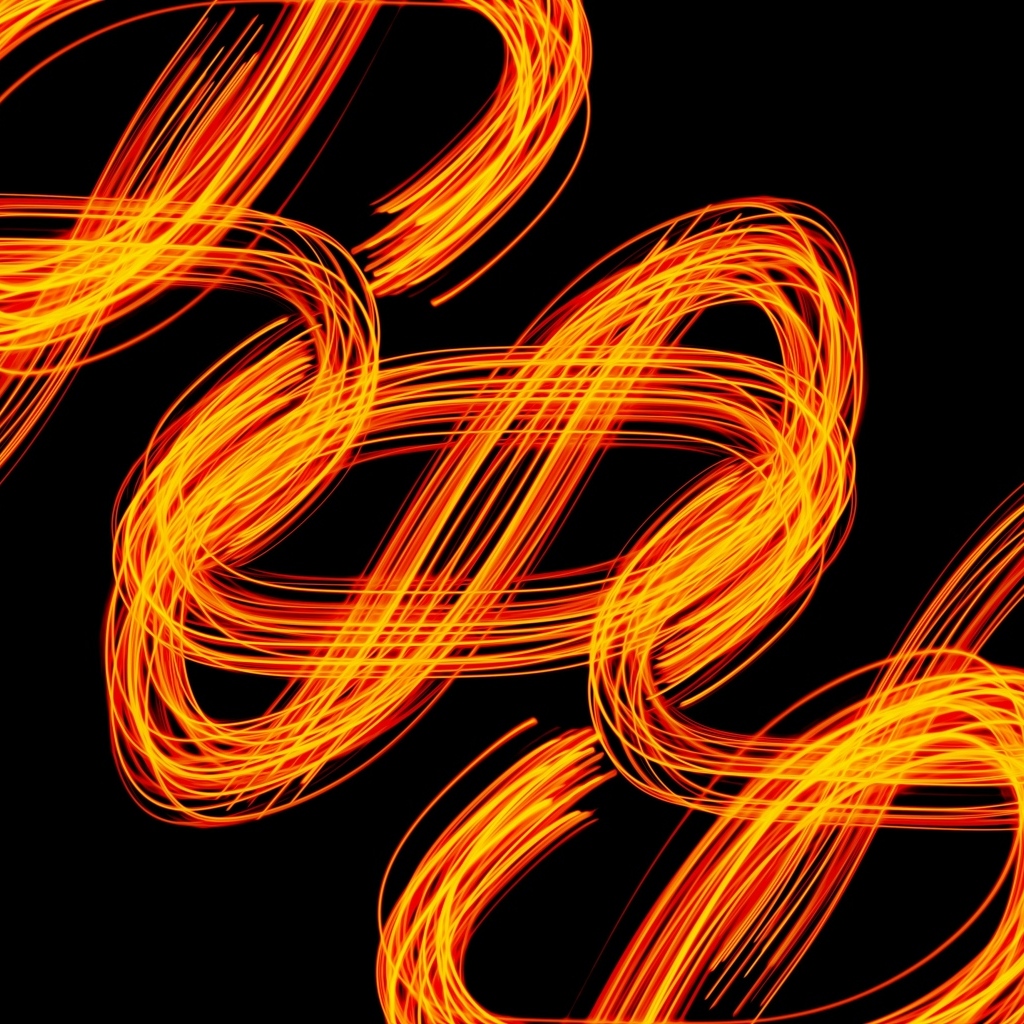 Огненные завитки на черном фоне