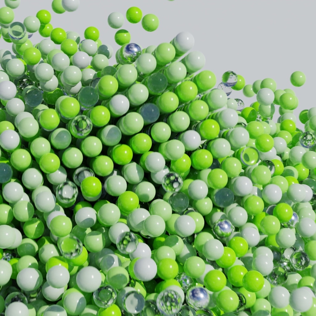 Много пластиковых и стеклянных зеленых шариков