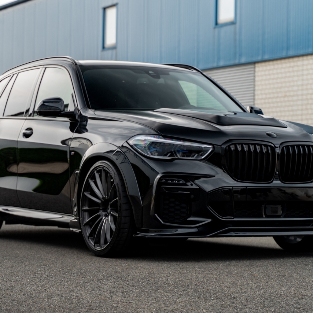 Черный автомобиль Prior-Design PDG5XWB Widebody Aerodynamic Kit