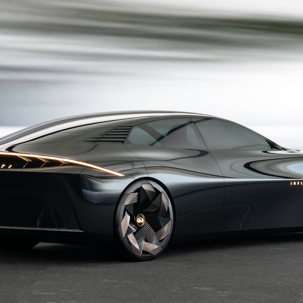 Вид сзади на черный автомобиль концепт Infiniti Vision Qe 2023 года