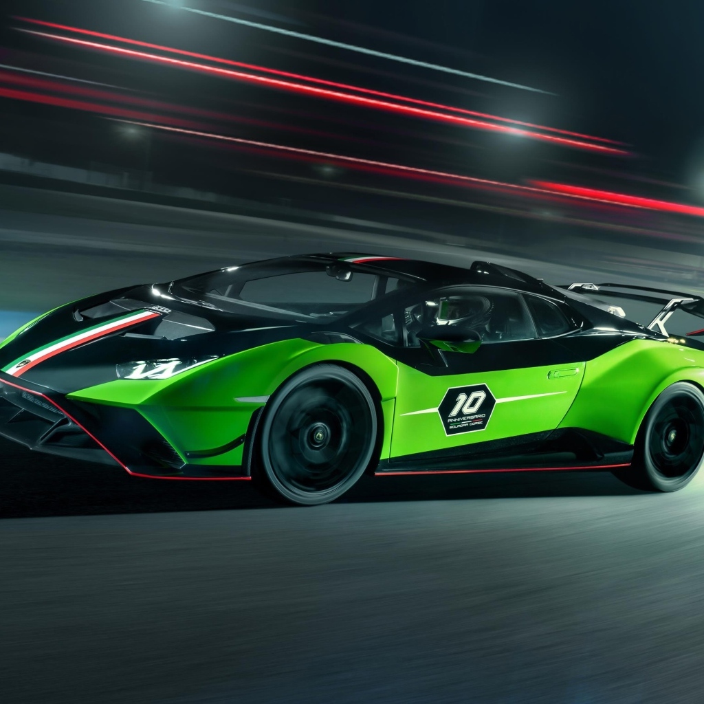 Зеленый быстрый автомобиль Lamborghini Huracan STO SC 10 Anniversario