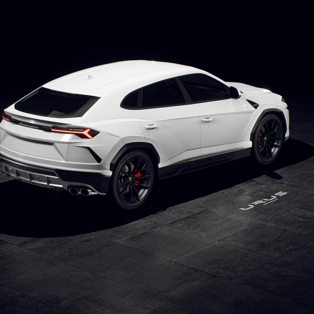Белый внедорожник Lamborghini Urus вид сзади