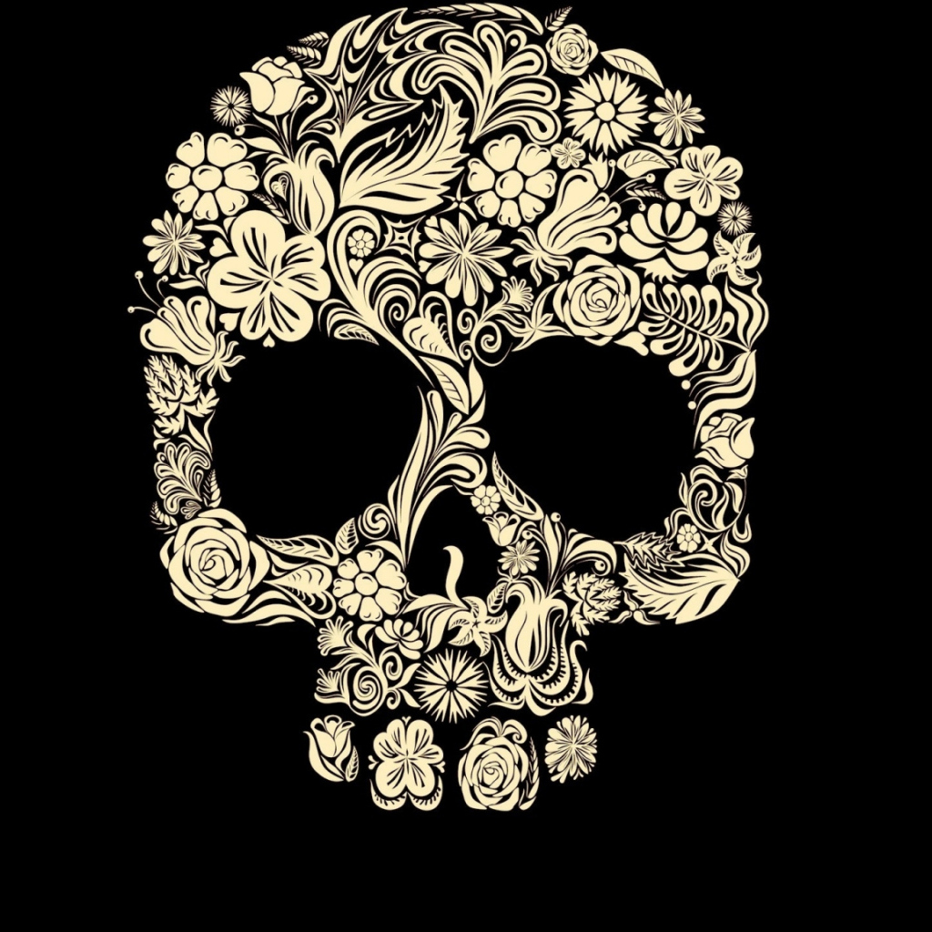 Череп из цветов на черном фоне