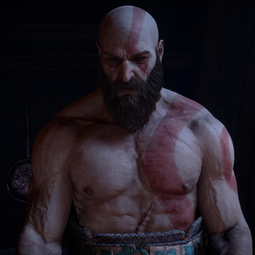 Накаченный мужчина Кратос персонаж компьютерной игры God of war