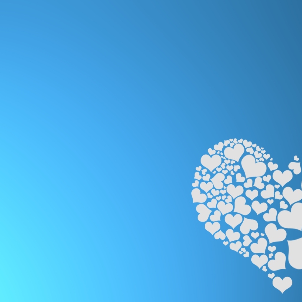 Маленькие белые сердечки рассыпаются на голубом фоне
