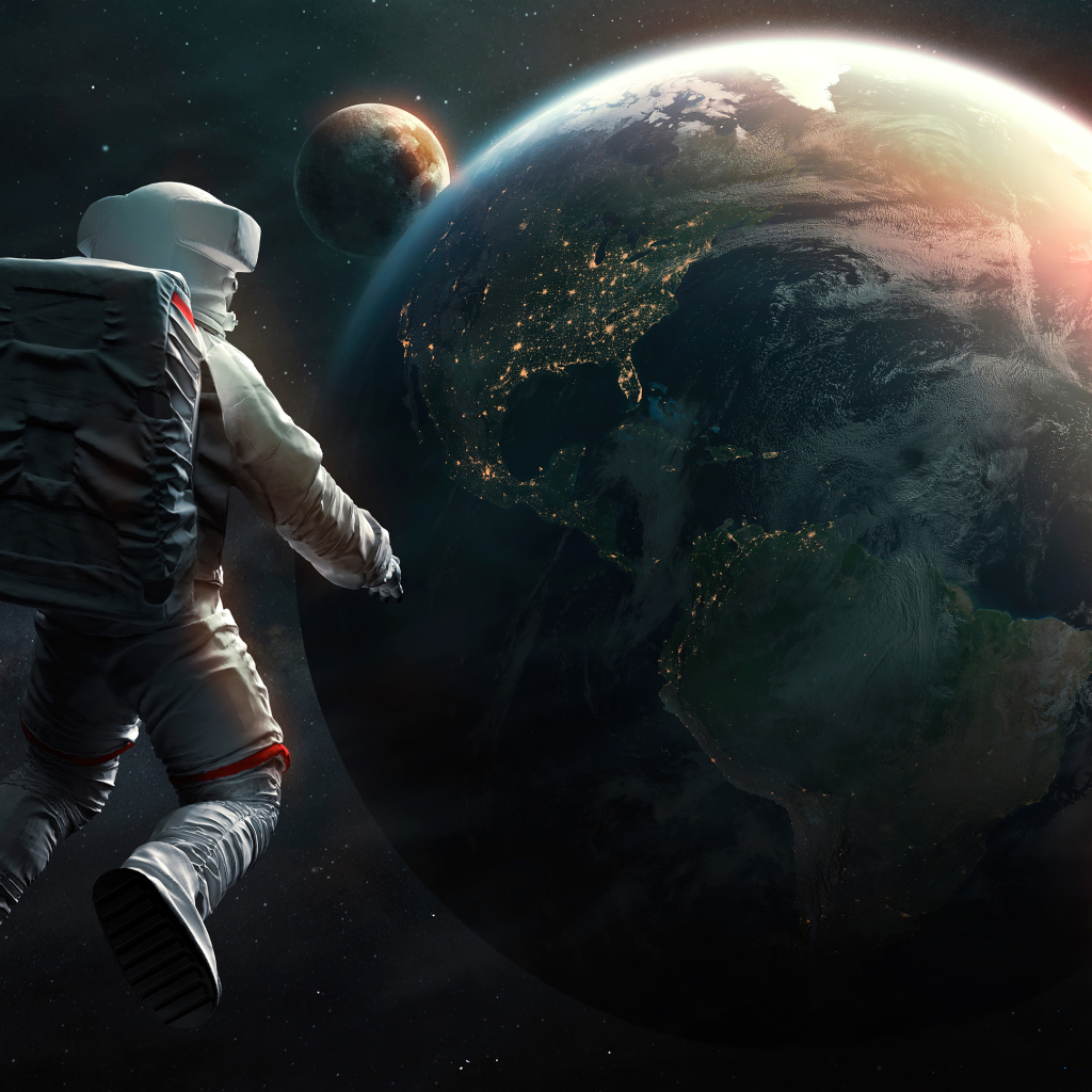 Астронавт смотрит на планету Земля из космоса