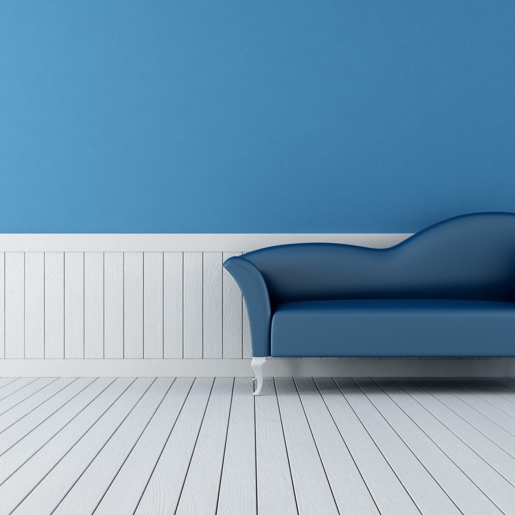 Диван в комнате с голубыми стенами и белым полом