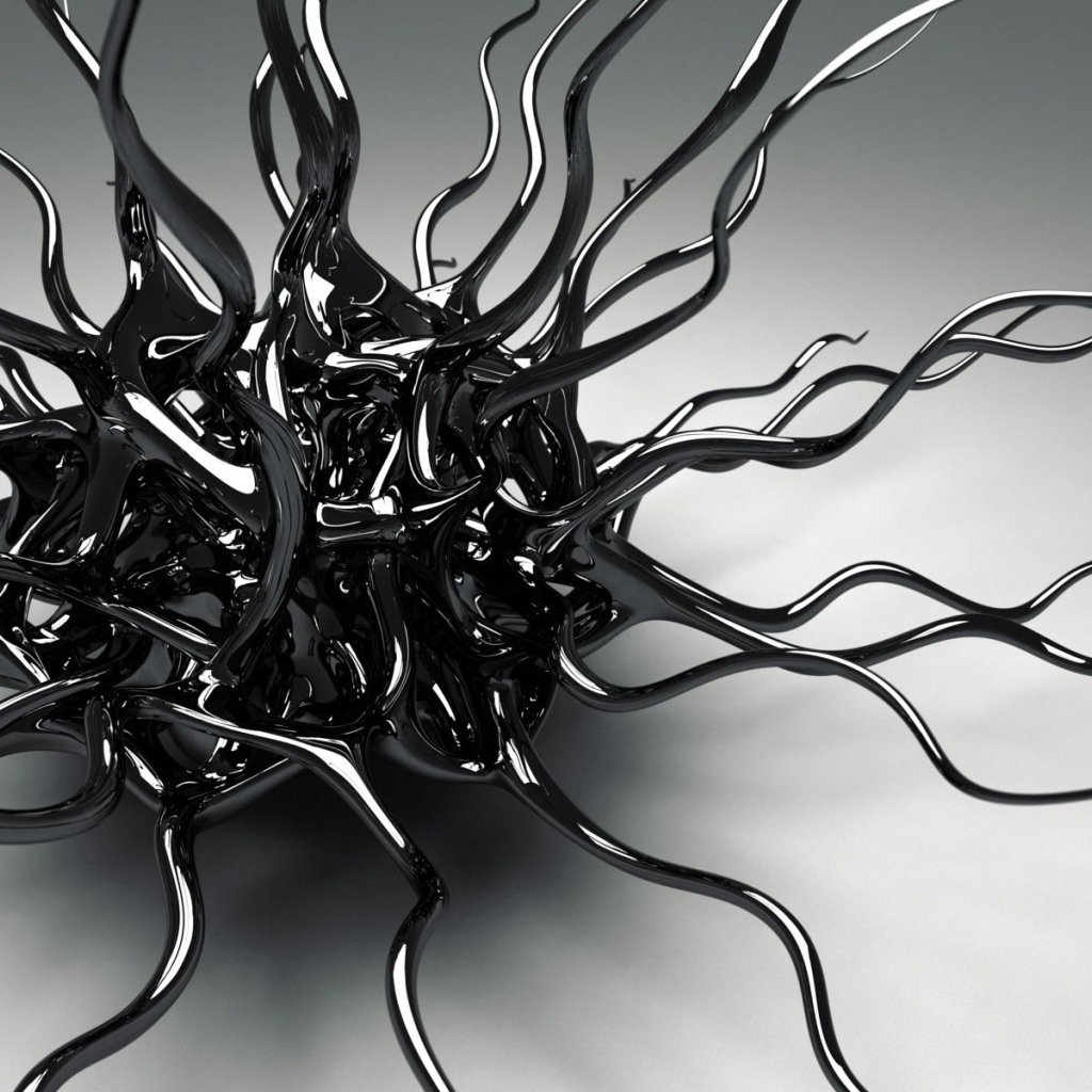 Черный металлический сплав на сером фоне