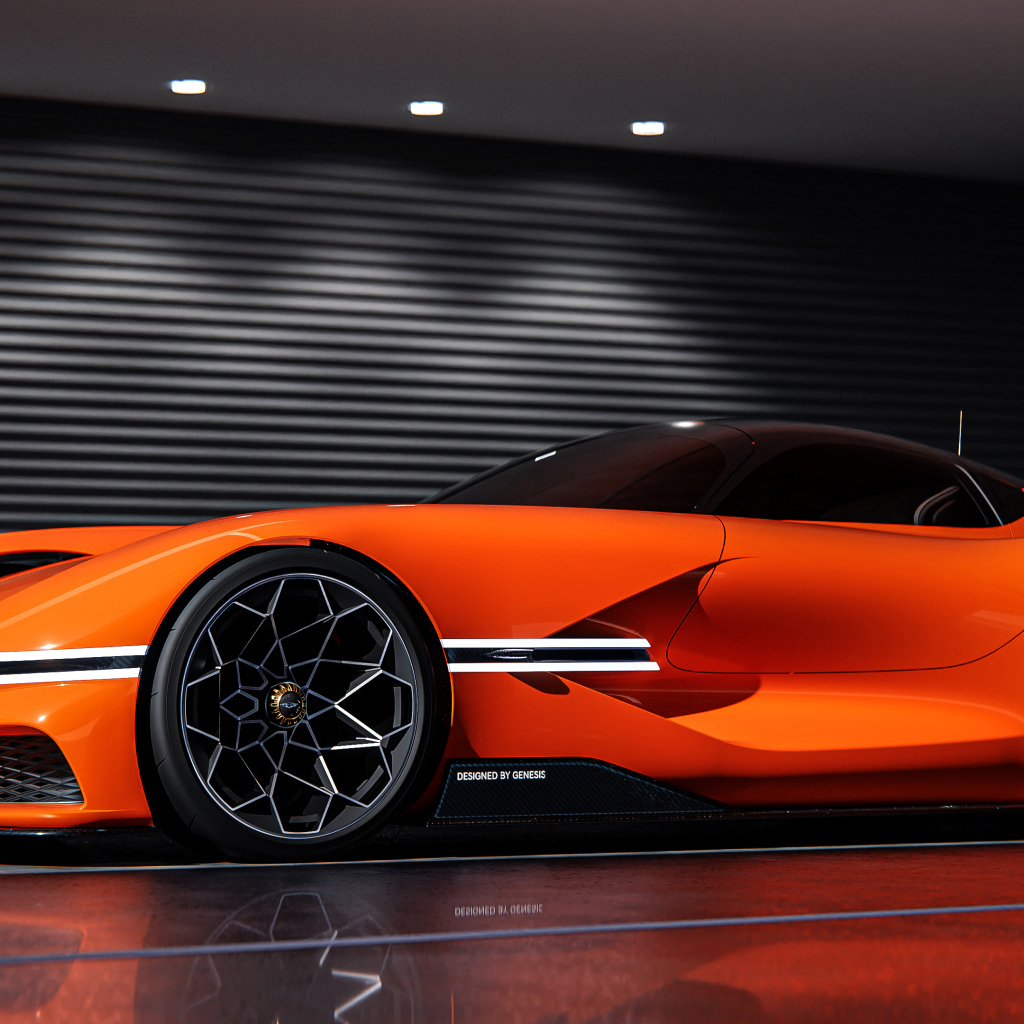 Быстрый оранжевый автомобиль Genesis X Gran Berlinetta вид сбоку