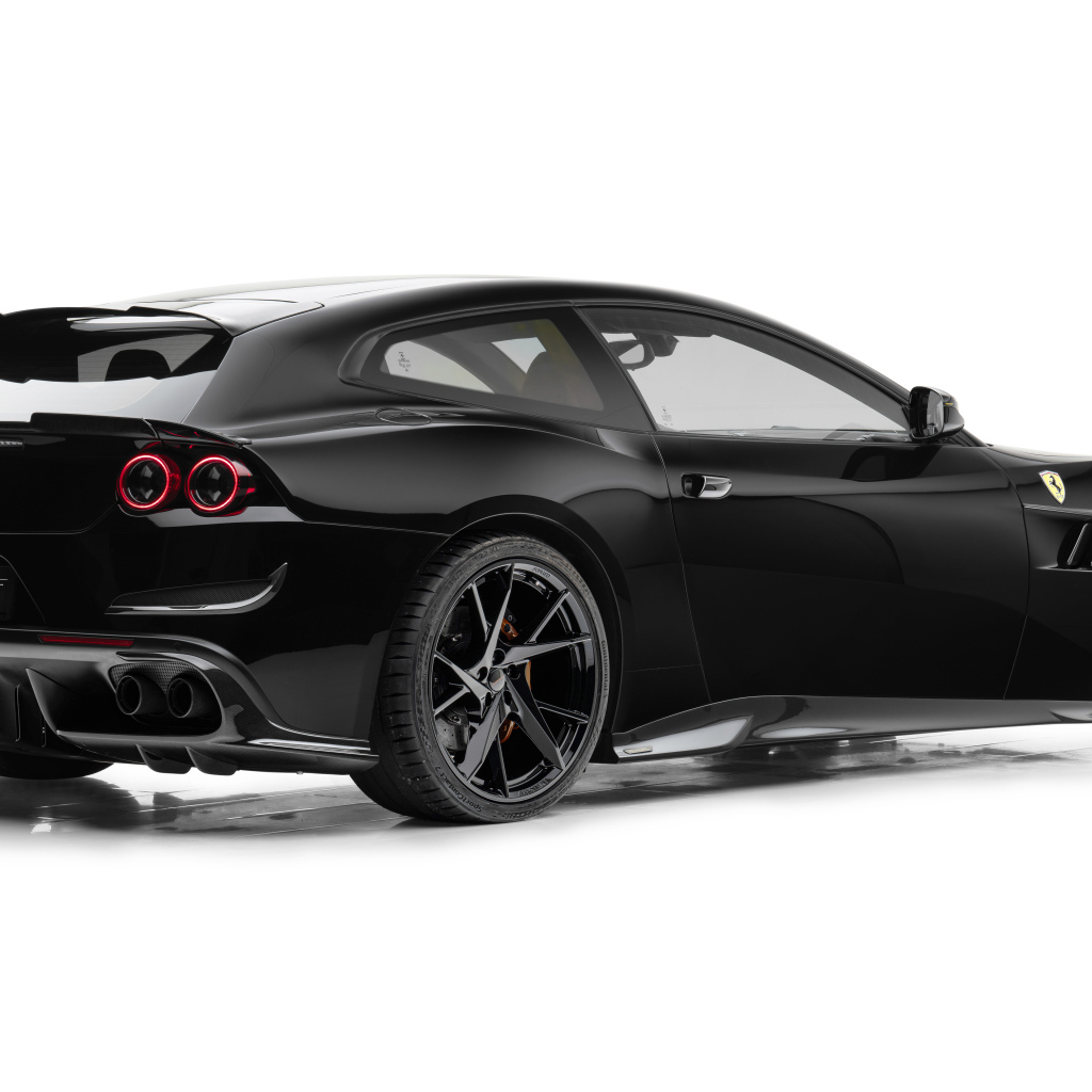 Вид сзади на черный автомобиль  Mansory Ferrari GTC4Lusso 2024 года