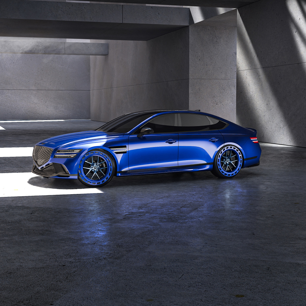 Вид сбоку на синий автомобиль  Genesis G80 EV Magma Concept 2024 года