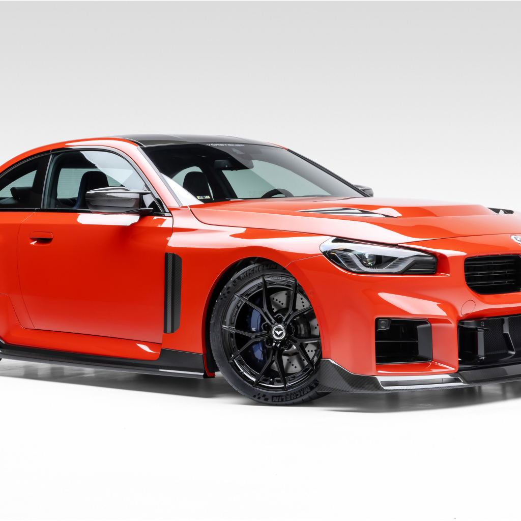 Автомобиль Vorsteiner BMW M2 With VRS Carbon Aero Kit 2024 года на белом фоне