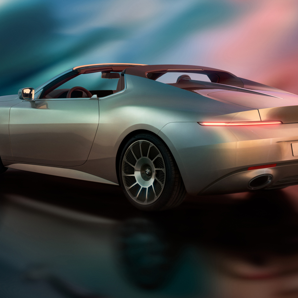 Вид сбоку на автомобиль  BMW Concept Skytop 2024