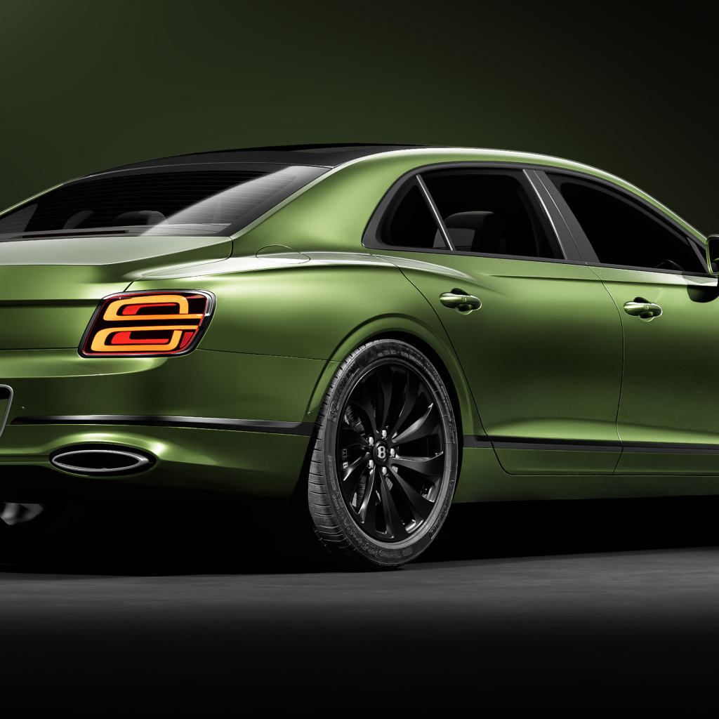 Зеленый автомобиль Bentley Flying Spur вид сзади