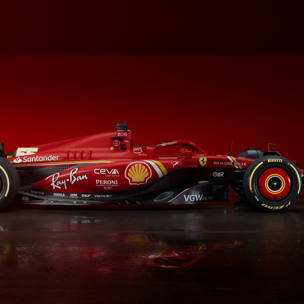 Красный гоночный автомобиль Ferrari SF-24 2024 года вид сбоку