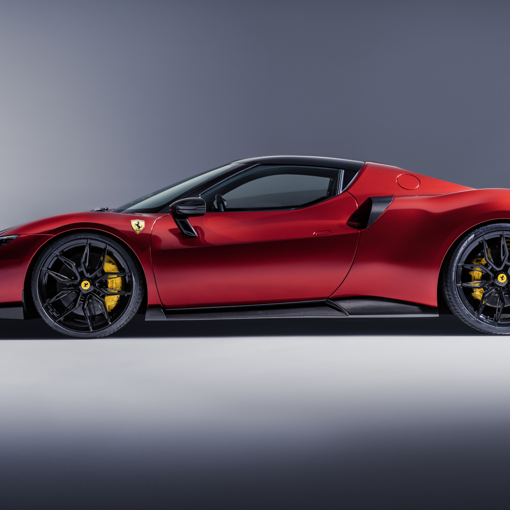 Красный автомобиль Novitec Ferrari 296 GTB Aero 2024 года на сером фоне