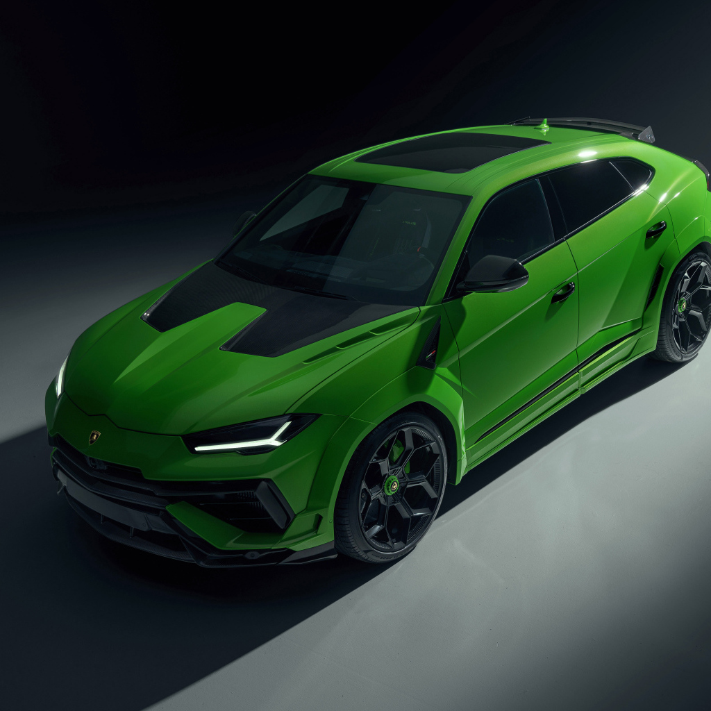 Вид сверху на автомобиль Lamborghini Urus на черном фоне