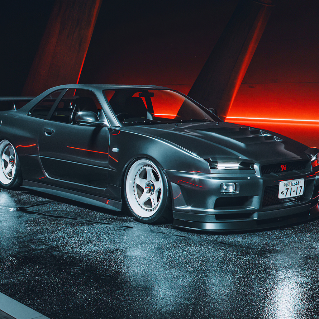 Черный автомобиль Nissan Skyline GTR R34