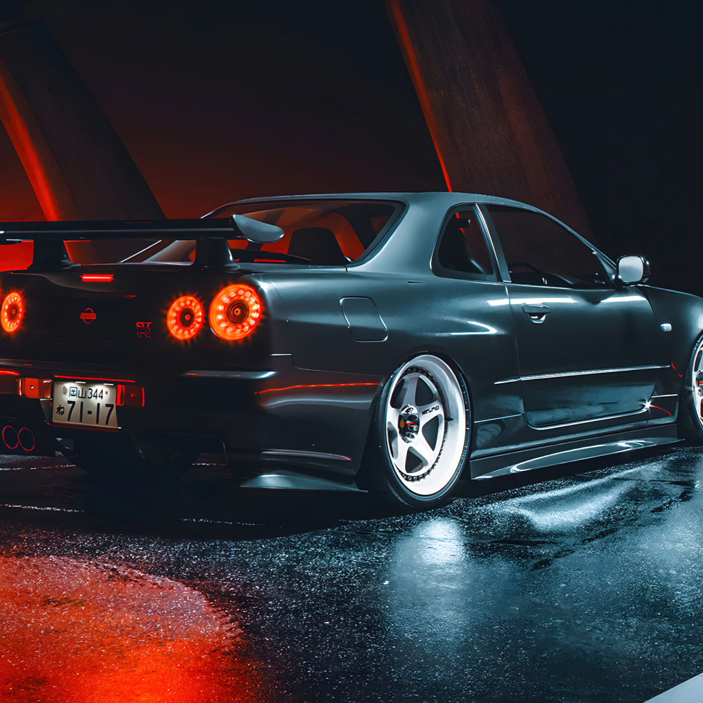 Черный автомобиль Nissan Skyline GTR R35 вид сзади