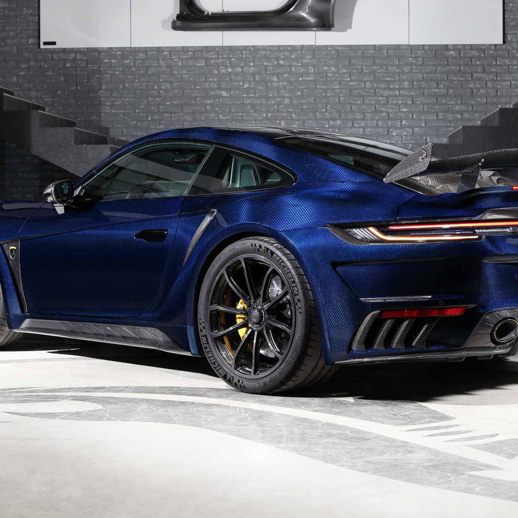 Синий автомобиль TopCar Porsche 911 Turbo S Stinger GTR Stealth Edition 2024  года