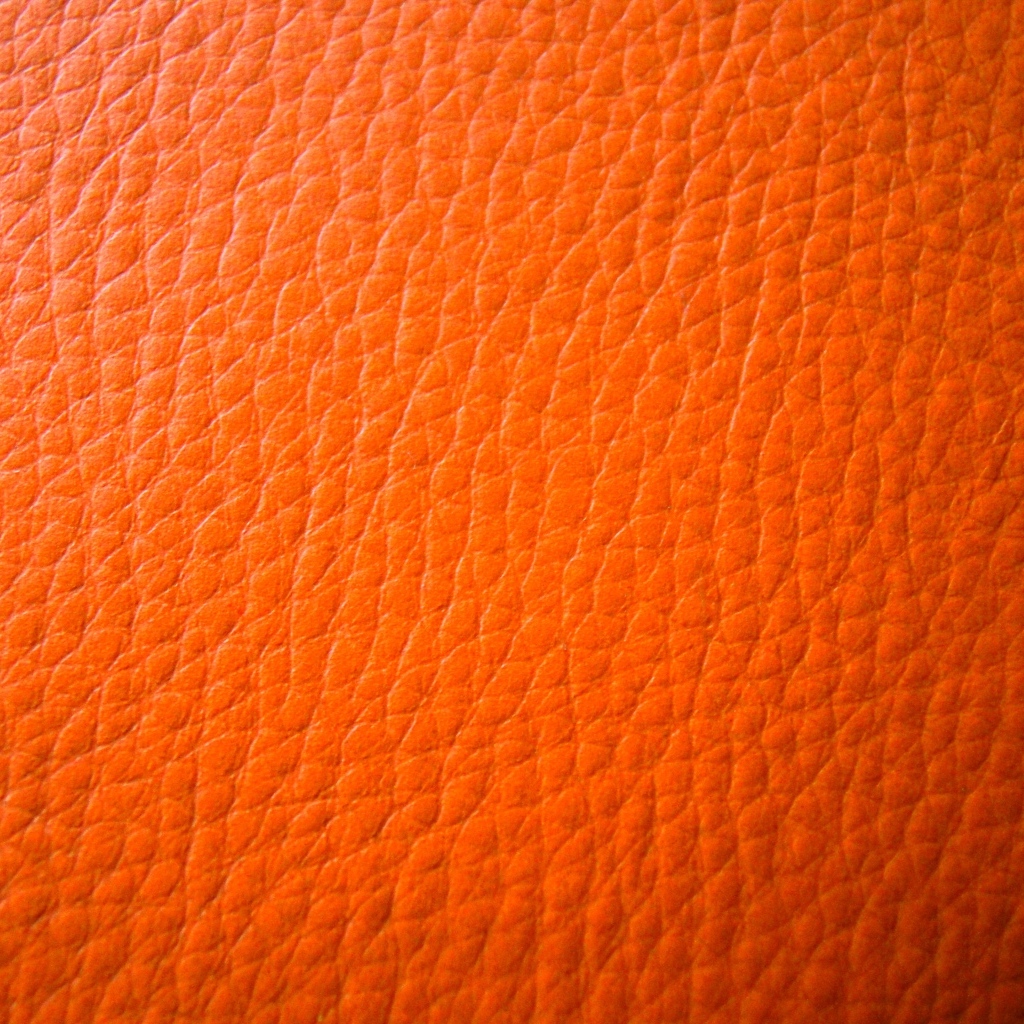 Оранжевый кожаный фон 