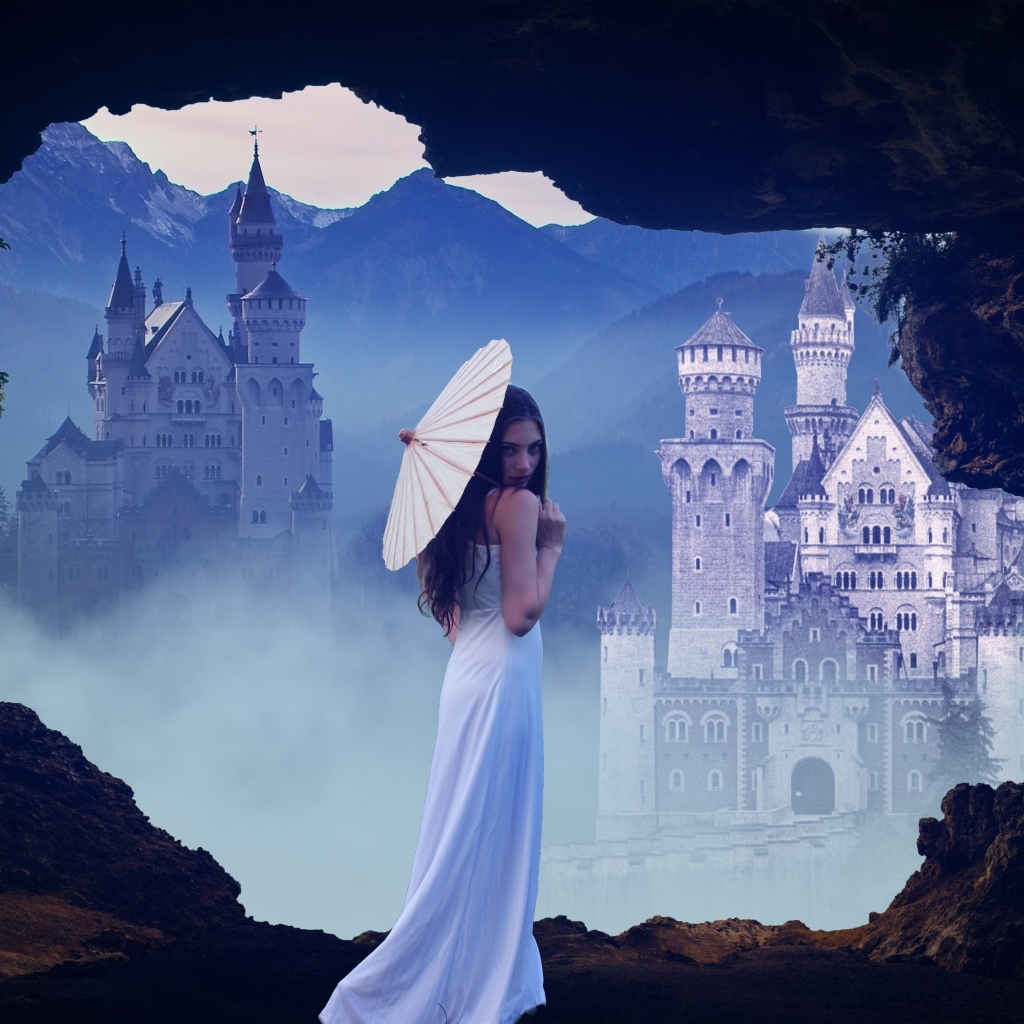 Девушка в белом платье с зонтом на фоне замка