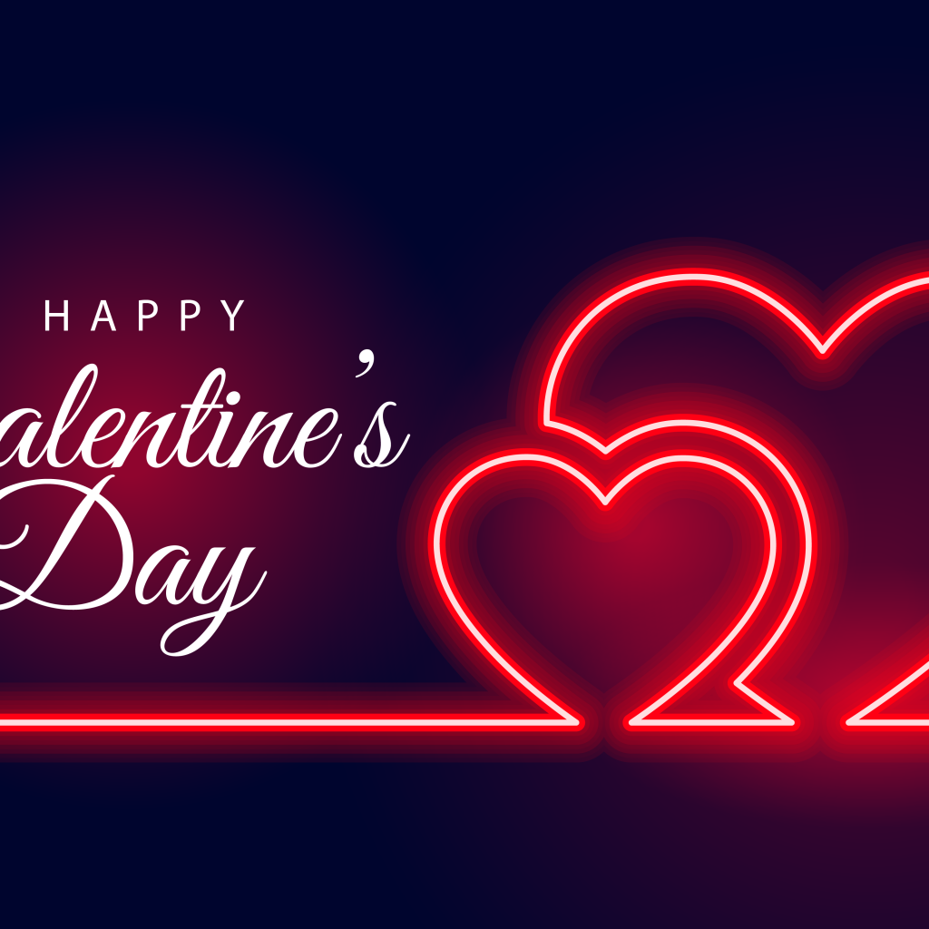 Два красных неоновых сердца на день святого Валентина