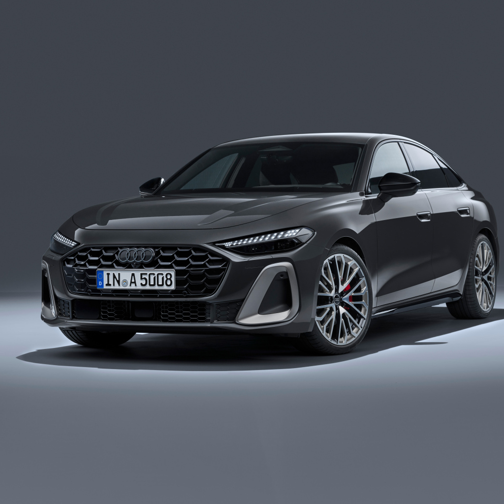 Автомобиль Audi A5 TFSI quattro S line 2024 года на сером фоне