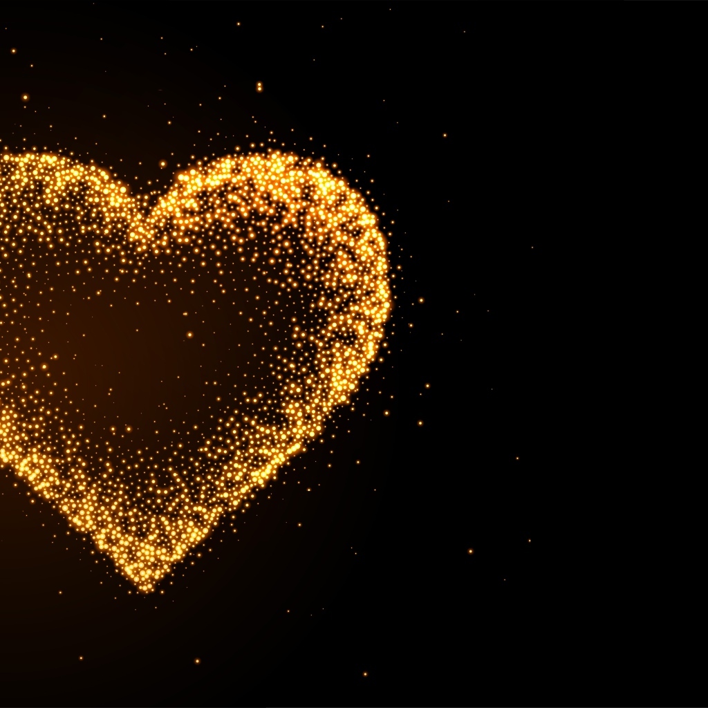 Яркое золотое сердце на черном фоне