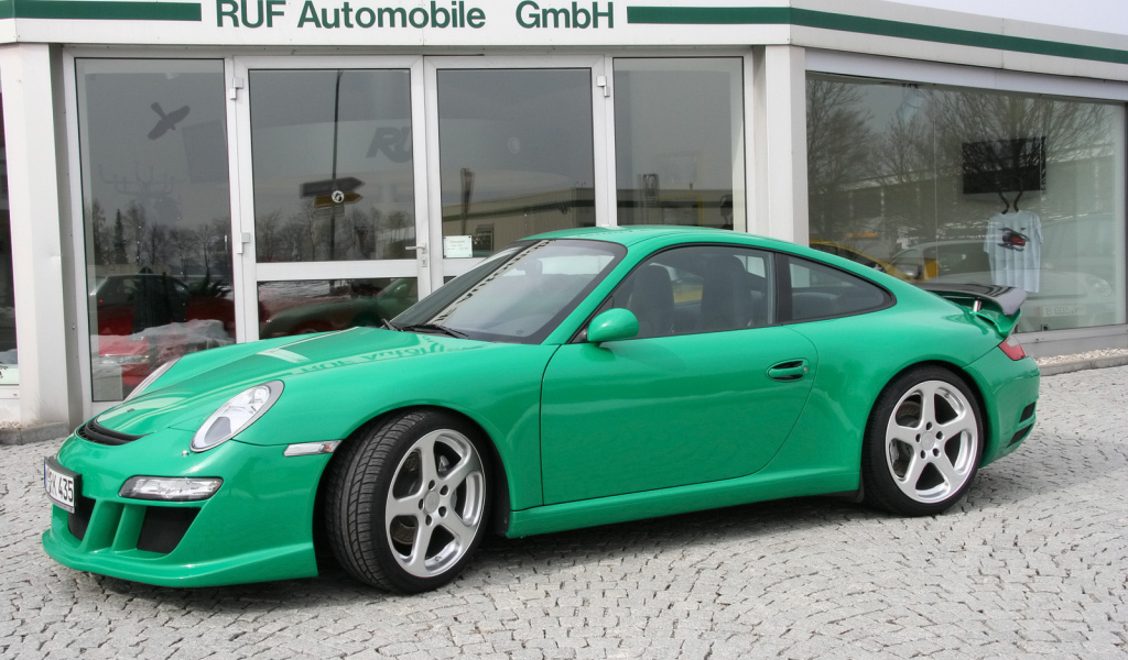 Зеленый Porsche Kompressor