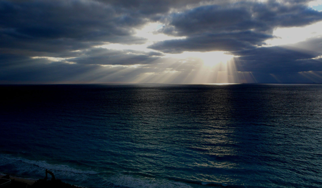 По карибскому, США