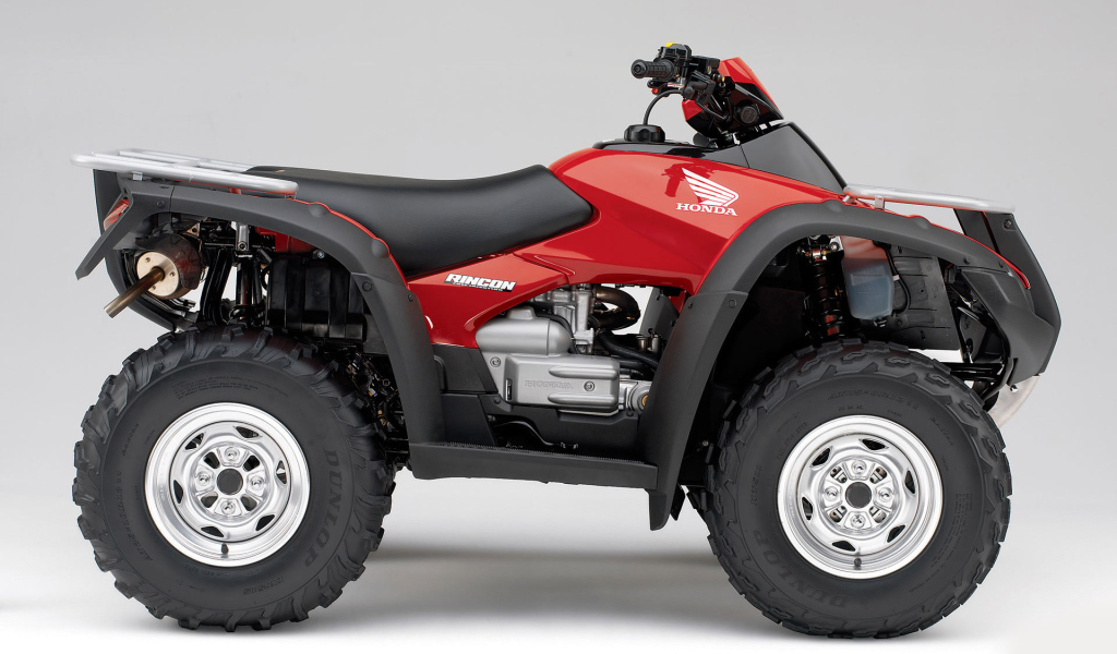 Красный Honda Rincon квадроцикл