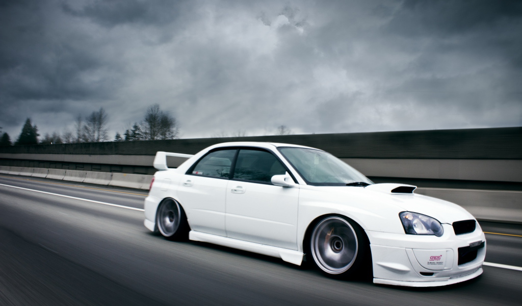 white Subaru Impreza STI