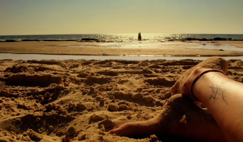 Ножки в песке