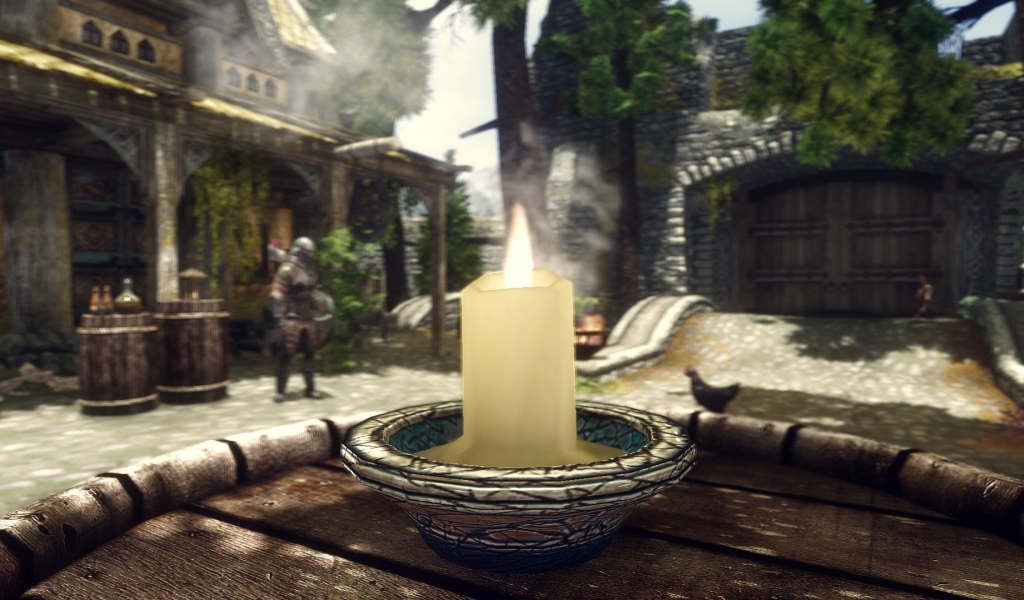 Горящая свеча на бочке