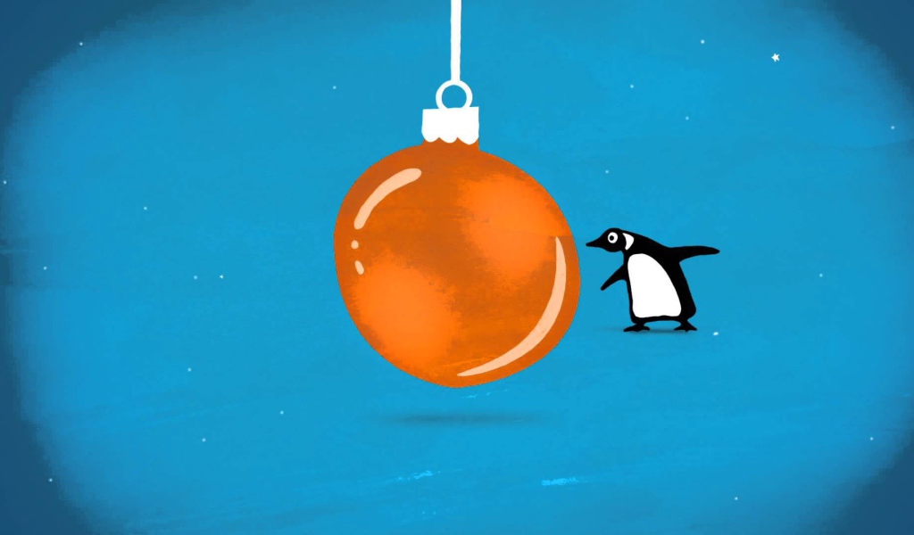 Пингвин и оранжевая ёлочная игрушка на рождество