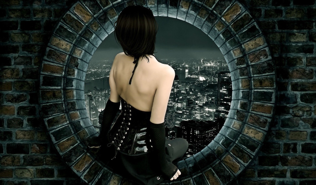 Девушка смотрит на город