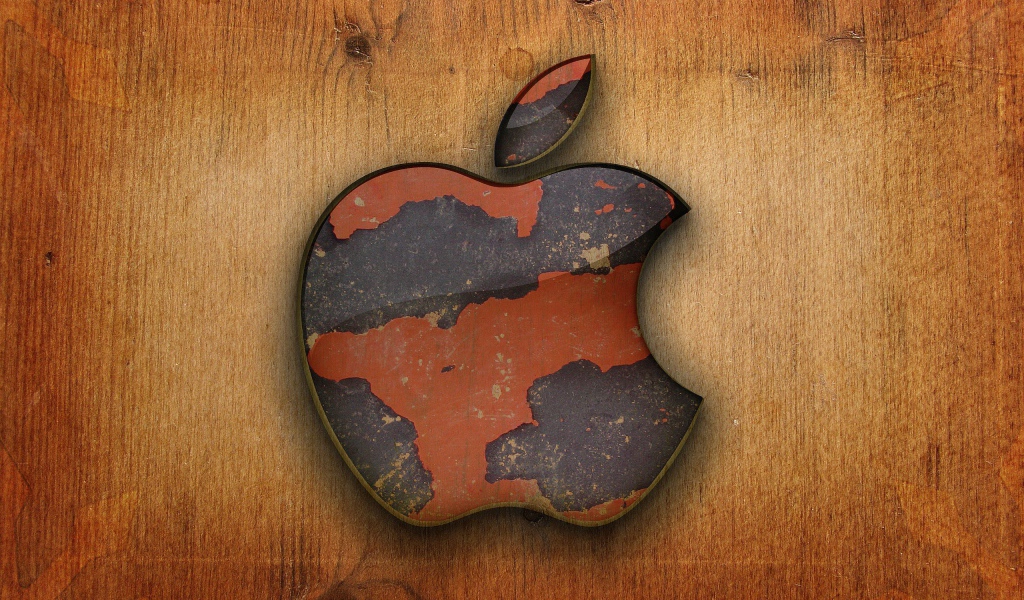 Apple на деревянном фоне