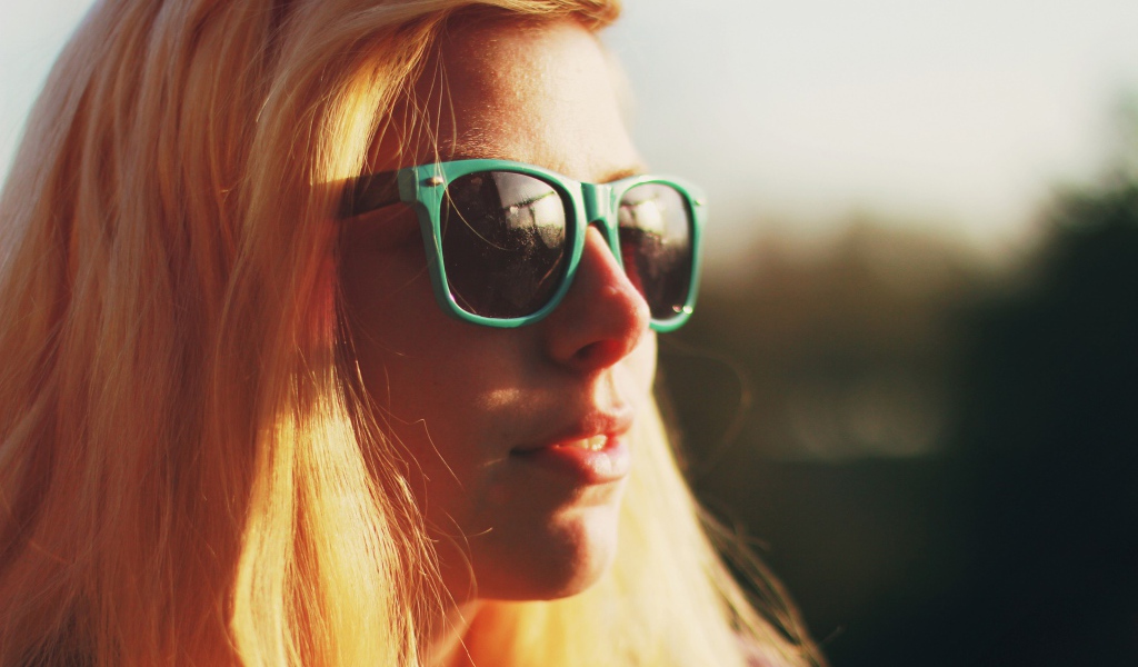 Blonde in green glasses