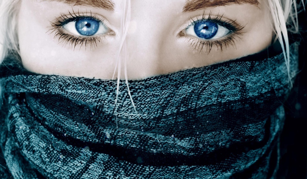 Blue eyes and a grey scarf