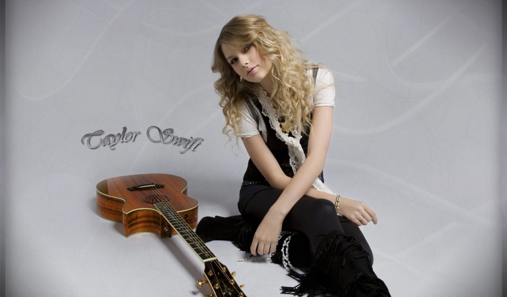 Тейлор с гитарой