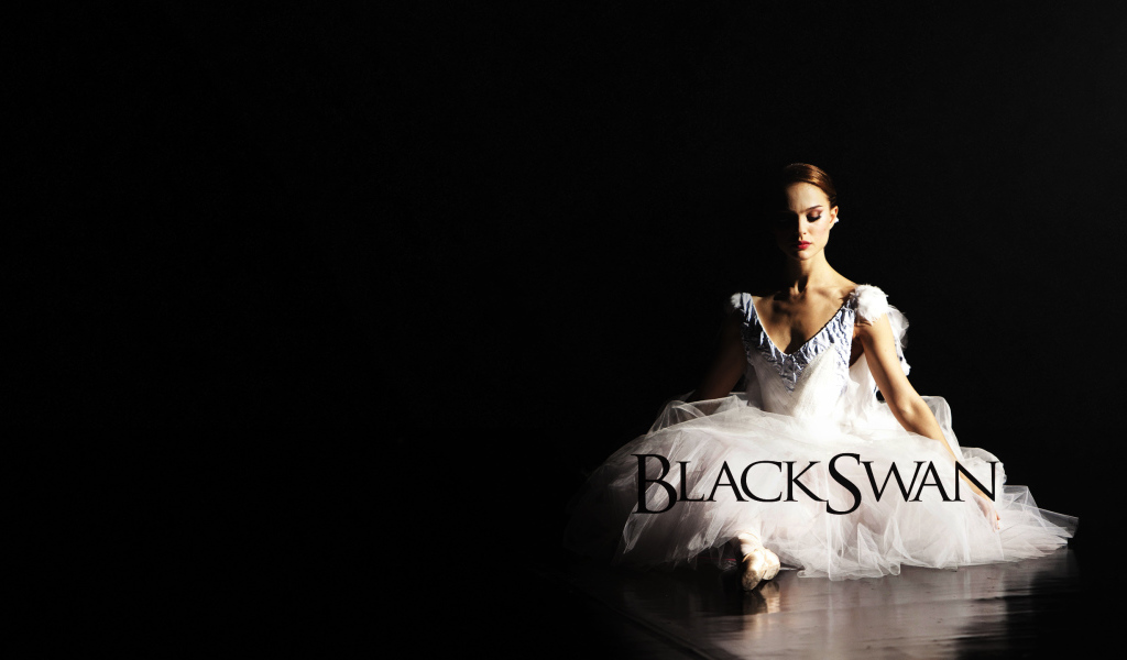 Балерина в образе белого лебедя