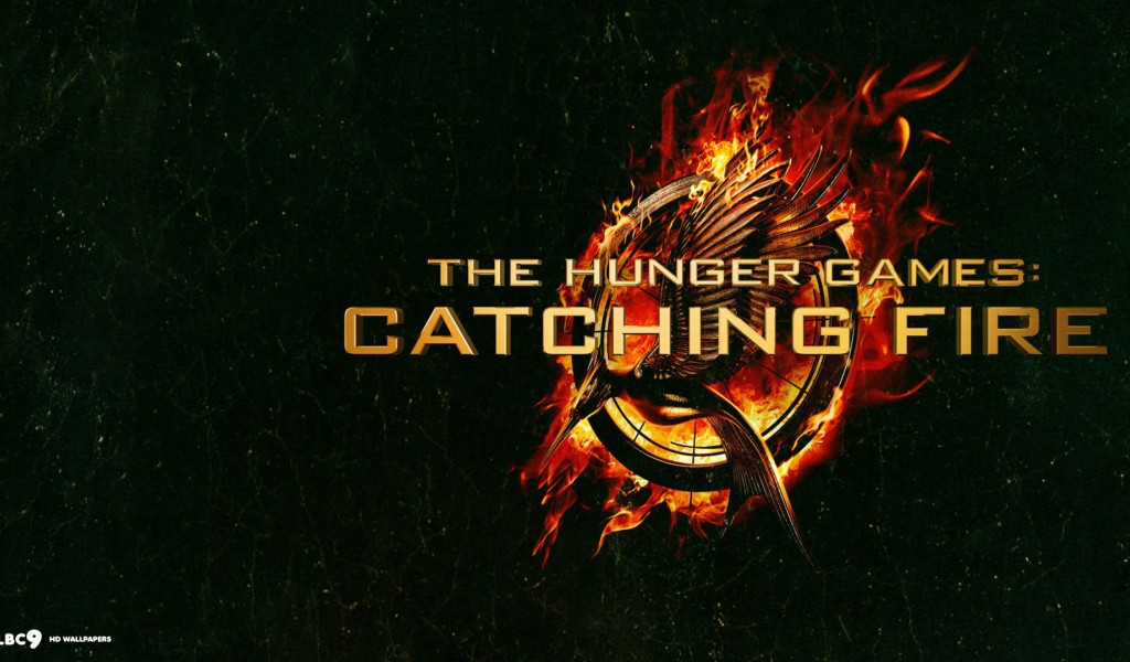 Голодные игры возгорания: логотип в зеленом фоне