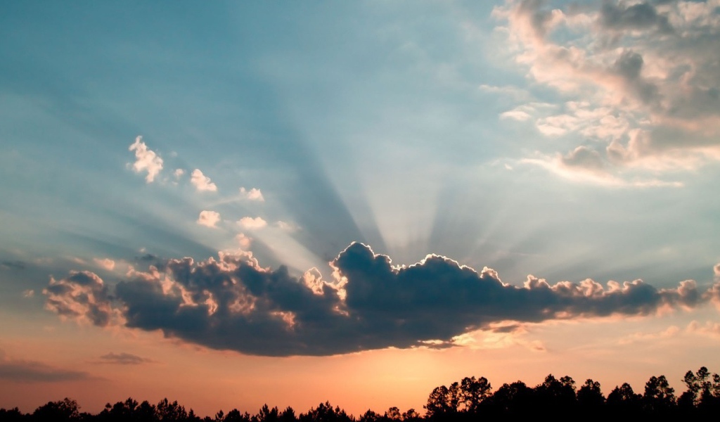 Лучи солнца из облака