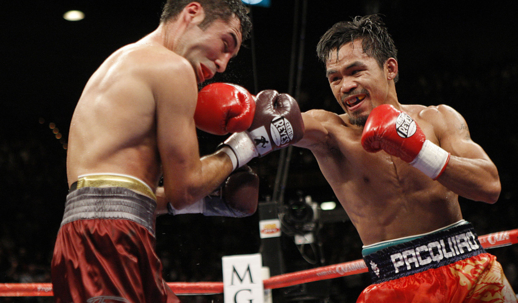 Боксер Оскар Дела Хойя против Паккьяо