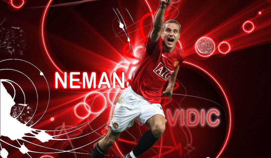  Незаменимый футболист Манчестер Юнайтед Неманья Видич на красном фоне