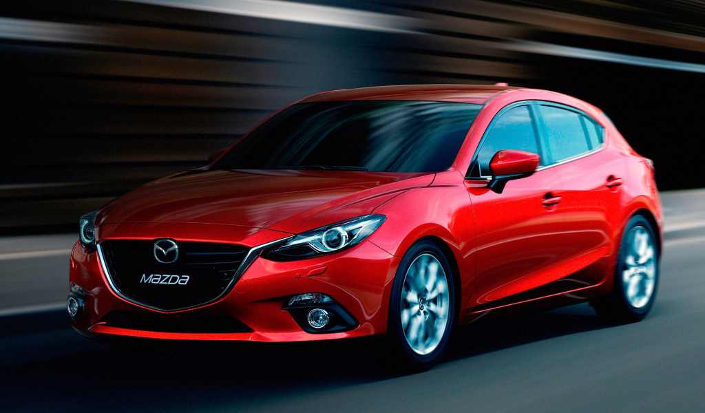 Красивый автомобиль Mazda 3 2014