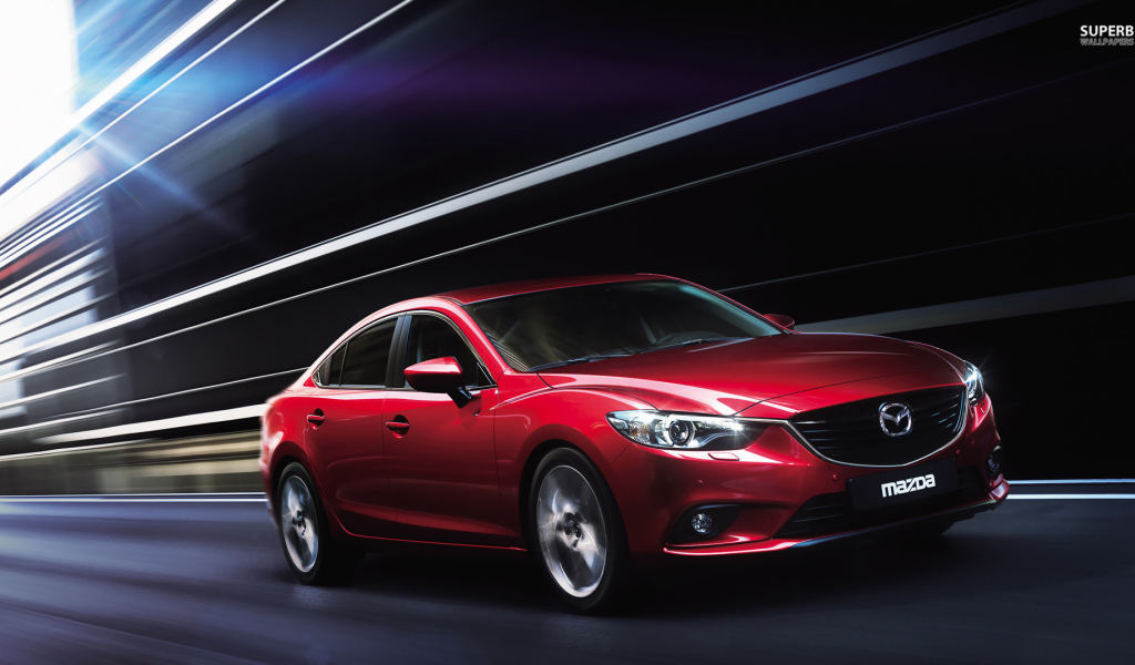 Надежная машина Mazda 3 2014