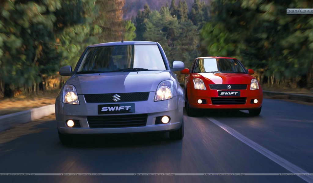 Suzuki Swift car on the road Desktop wallpapers 1024x600